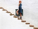 Read more to find out how post-menopausal women can benefit from climbing stairs.(Unsplash)