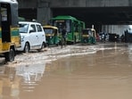 Vehicles wade through a waterlogged stretch on Mehrauli–Badarpur Road near Jamia Hamdard University after heavy rain on Wednesday, August 5(Arvind Yadav/Hindustan Times)