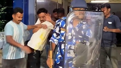 Bidhannagar, Jun 09 (ANI): People hurl eggs at Former Mayor Sabyasachi Dutta who is being sent to 8-day police custody amid arrest, in Bidhannagar on Tuesday. (ANI Video Grab) (ANI Video Grab) Bidhannagar, Jun 09 (ANI): People hurl eggs at Former Mayor Sabyasachi Dutta who is being sent to 8-day police custody amid arrest, in Bidhannagar on Tuesday. (ANI Video Grab) (ANI Video Grab)