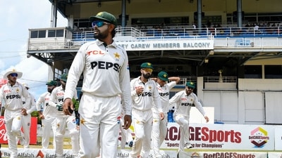 Babar Azam (C) of Pakistan leads his teammates on to the field during the 1st day of the 2nd Test match between West Indies and Pakistan at Queens Park Oval (AFP) Babar Azam (C) of Pakistan leads his teammates on to the field during the 1st day of the 2nd Test match between West Indies and Pakistan at Queens Park Oval (AFP)