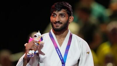 India's Harsh Singh poses with his gold medal in the men's 60kg judo at the Commonwealth Games in Glasgow. (AP Photo) India's Harsh Singh poses with his gold medal in the men's 60kg judo at the Commonwealth Games in Glasgow. (AP Photo)