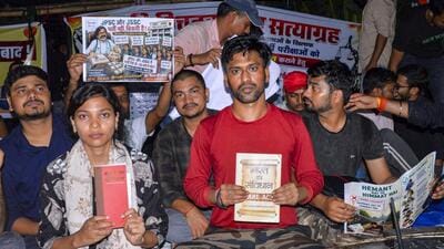 Students protesting against the alleged examination irregularities in Ranchi. (PTI)