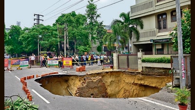 The road that gave way in Kitchlu Nagar area in Ludhiana on Thursday. (Gurpreet Singh/HT) The road that gave way in Kitchlu Nagar area in Ludhiana on Thursday. (Gurpreet Singh/HT)