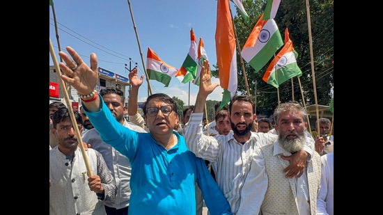 BJP workers held a 'Tiranga' rally to mark the anniversary of the abrogation of Article 370 and 35A, in Anantnag district on Wednesday. (PTI)