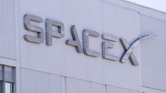 SpaceX stock faces a key year ahead as revenue, Starlink and AI growth rise. (Photo by Patrick T. Fallon / AFP)