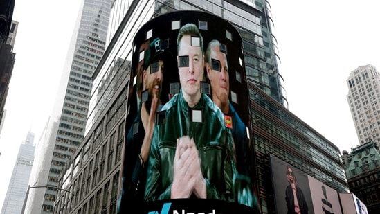 FILE PHOTO: A live feed shows SpaceX CEO Elon Musk on the day of SpaceX's initial public offering (IPO) at the Nasdaq MarketSite, in New York City, U.S., June 12, 2026. 