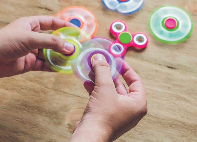 Forbes labelled the fidget spinner as a “must-have office toy” in 2016 (SHUTTERSTOCK)
