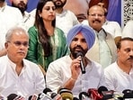 AICC General Secretary and In-Charge of Punjab Congress Affairs, Bhupesh Baghel, and Punjab Pradesh Congress committee president and Ludhiana MP, Amarinder Singh Raja Warring addressing a press conference. (Gurpreet Singh/HT)
