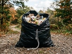 Why do garbage bags have that white string?