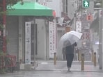 Authorities issued evacuation orders for nearly 260,000 residents in Kagoshima and Okinawa prefectures, while Toyota suspended work at nine factories on Friday.(NTV-NNN via AP)