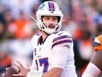 Josh Allen was lying on the field while receiving Theragun treatment on his shoulder during practice