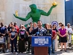 Michigan Democratic Senate primary winner Abdul El-Sayed speaks during a press conference in front of the Spirit of Detroit statue.