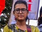 All India Student's Association (AISA) National President Neha Bora after a man threw ink on her during a protest against the alleged irregularities of examinations conducted by Jharkhand Public Service Commission (JPSC) and Jharkhand Staff Selection Commission (JSSC), in Ranch.(PTI)