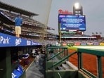 The outfield video board announces a weather delay before a game between the Toronto Blue Jays and the Philadelphia Phillies at Citizens Bank Park in Philadelphia, Pennsylvania. (Getty Images via AFP)