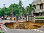 The road that gave way in Kitchlu Nagar area in Ludhiana on Thursday. (Gurpreet Singh/HT)