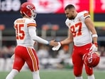 Travis Kelce and Patrick Mahomes face legal action from 1587 Sneakers for trademark infringement linked to their steakhouse.(Sarah Stier/Getty Images)