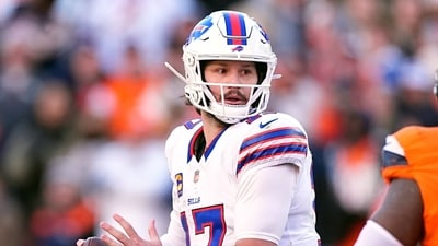 Josh Allen was lying on the field while receiving Theragun treatment on his shoulder during practice (AP) Josh Allen was lying on the field while receiving Theragun treatment on his shoulder during practice (AP)
