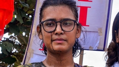 All India Student's Association (AISA) National President Neha Bora after a man threw ink on her during a protest against the alleged irregularities of examinations conducted by Jharkhand Public Service Commission (JPSC) and Jharkhand Staff Selection Commission (JSSC), in Ranch. (PTI) All India Student's Association (AISA) National President Neha Bora after a man threw ink on her during a protest against the alleged irregularities of examinations conducted by Jharkhand Public Service Commission (JPSC) and Jharkhand Staff Selection Commission (JSSC), in Ranch. (PTI)
