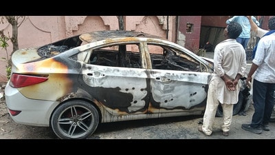 The charred vehicle after it was set on fire by unidentified miscreants in Bhai Himmat Singh Nagar, Dugri, Ludhiana on Friday. (HT Photo) The charred vehicle after it was set on fire by unidentified miscreants in Bhai Himmat Singh Nagar, Dugri, Ludhiana on Friday. (HT Photo)