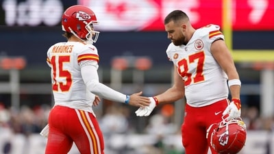 Travis Kelce and Patrick Mahomes face legal action from 1587 Sneakers for trademark infringement linked to their steakhouse. (Sarah Stier/Getty Images)