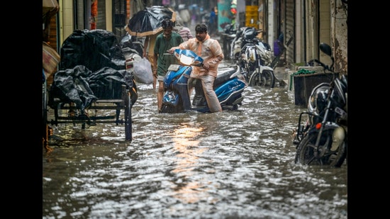 A waterlogged stretch at Azad Market on Friday. (RAJ K RAJ /HT PHOTO)