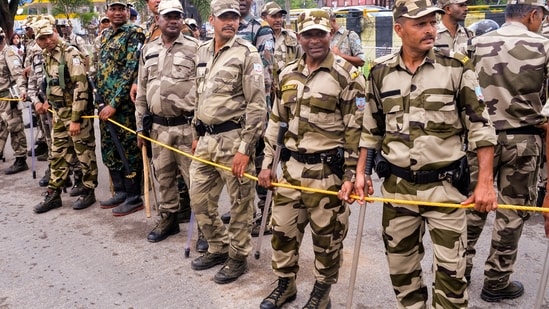 Security personnel present during a protest against the alleged irregularities of examinations conducted by Jharkhand Public Service Commission (JPSC) and Jharkhand Staff Selection Commission (JSSC) in Ranchi. Security personnel present during a protest against the alleged irregularities of examinations conducted by Jharkhand Public Service Commission (JPSC) and Jharkhand Staff Selection Commission (JSSC) in Ranchi.