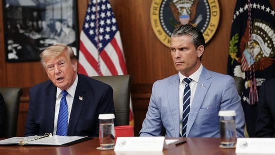 US President Donald Trump speaks alongside secretary of defence Pete Hegseth during a Cabinet meeting at Camp David in Maryland.