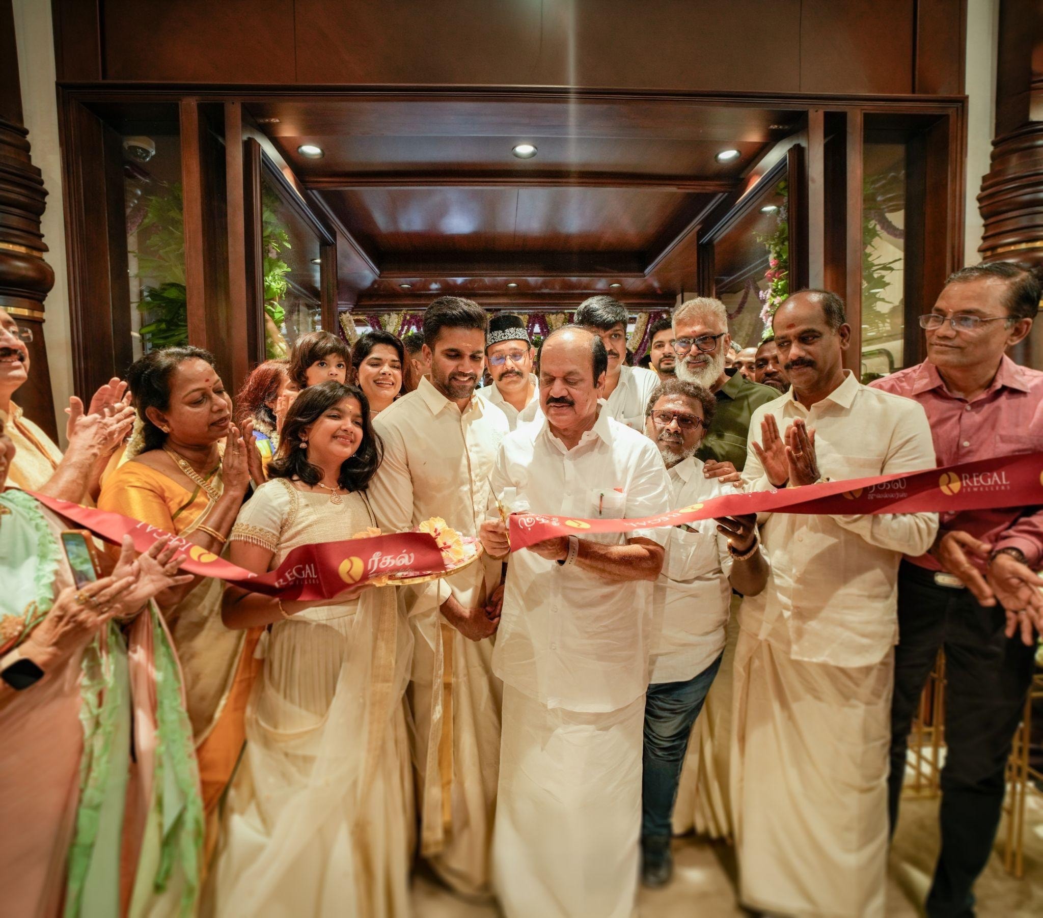 Hon'ble Speaker Thiru J.C.D. Prabhakar (Speaker, Tamil Nadu Legislative Assembly), Thiru V.M.S. Mustafa (MLA, Madurai Central Constituency), Thiru Sivadasan TK (Chairman, Regal Jewellers), Mr. Vibin Shivdas (Managing Director & CEO, Regal Jewellers), Mrs. Pallavi Namdev (Managing Director, Regal Jewellers), and Mr. Gopal M.K. (COO, Regal Jewellers). Hon'ble Speaker Thiru J.C.D. Prabhakar (Speaker, Tamil Nadu Legislative Assembly), Thiru V.M.S. Mustafa (MLA, Madurai Central Constituency), Thiru Sivadasan TK (Chairman, Regal Jewellers), Mr. Vibin Shivdas (Managing Director & CEO, Regal Jewellers), Mrs. Pallavi Namdev (Managing Director, Regal Jewellers), and Mr. Gopal M.K. (COO, Regal Jewellers).