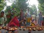 The panel led by Dr Radha Mohan Das Agrawal sought detailed information on the rehabilitation of displaced Hindu migrant populations. (In picture: Kashmiri Pandit devotees light earthen lamps during the annual Hindu festival in the Kheer Bhawani Temple)(HT Photos)