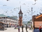 Armed security personnel present near Ghanta Ghar as security tightens in and around Lal Chowk on the 7th anniversary of the revocation of Article 370, in Srinagar on Wednesday. (ANI)