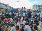 According to police, at least 80 to 90 people sat on the road after blocking it with tractors, disrupting traffic flow from 10am to 3pm. (HT)