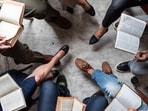 In Chandigarh as well as Ludhiana, silent reading parties and book clubs are offering a quieter way to connect, one where conversation is optional, but books are not. (Adobe Stock photo for representational purpose)