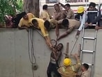 Fire department personnel rescue a 47-year-old man after he reportedly slipped into a drain in the Shastri Nagar locality on Friday. (Sakib Ali/HT PHOTO)