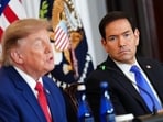 Secretary of State Marco Rubio listens as President Donald Trump speaks during a roundtable on the American mining industry on Friday at the State Department in Washington. (AP)