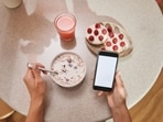Dr Sethi warns against scrolling through the phone while eating, among other things. 