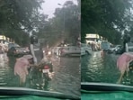 A Delhi biker’s kind gesture towards an elderly woman on a flooded road has touched hearts online.(Instagram/rohit.choudhhary)