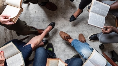 In Chandigarh as well as Ludhiana, silent reading parties and book clubs are offering a quieter way to connect, one where conversation is optional, but books are not. (Adobe Stock photo for representational purpose) In Chandigarh as well as Ludhiana, silent reading parties and book clubs are offering a quieter way to connect, one where conversation is optional, but books are not. (Adobe Stock photo for representational purpose)