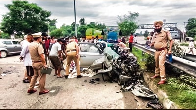Police personnel at the site of an accident after a speeding car crashed into a stationary truck on the Jalandhar-Maksudan Bypass Highway, in Jalandhar on Saturday. (ANI Video Grab)