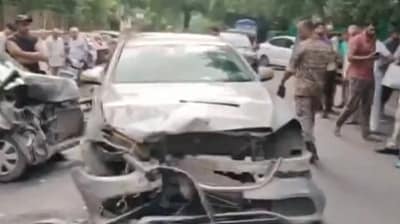 The collision between the two cars took place at 8 am on Saturday in front of the Himalayas Apartment in the Mamurpur area. (ANI video grab) The collision between the two cars took place at 8 am on Saturday in front of the Himalayas Apartment in the Mamurpur area. (ANI video grab)
