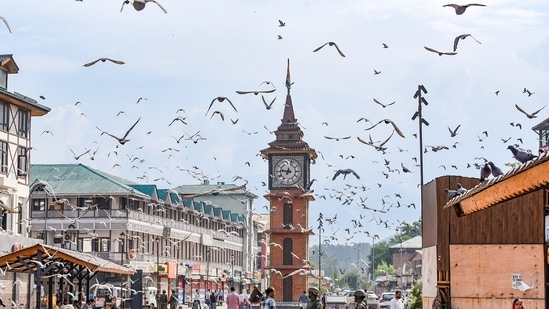 Armed security personnel present near Ghanta Ghar as security tightens in and around Lal Chowk on the 7th anniversary of the revocation of Article 370, in Srinagar on Wednesday.
