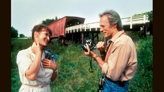 How many of us would smile at a stranger today, exchange numbers, allow for the idea that they may not be a threat? (Above) A still from The Bridges of Madison County (1992).
