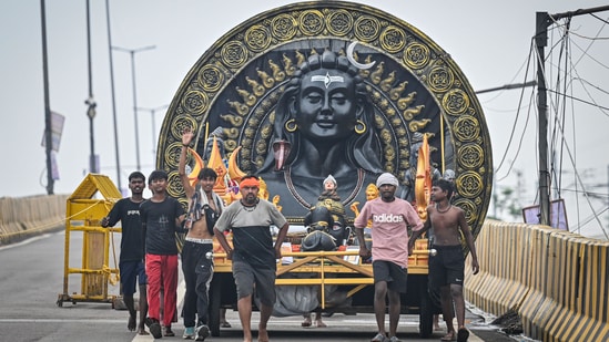 Gram it: Kanwariyas carrying containers filled with holy water collected from the Ganga River in Haridwar, during the annual Kanwar Yatra, spotted at Dilshad Garden with an elaborate tableau. The month-long celebrations of Sawan will end on August 11. 