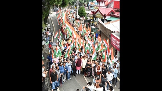 LoP Jai Ram Thakur and other BJP leaders carry out a Tiranga Yatra in Shimla on Saturday. (Deepak Sansta/HT)