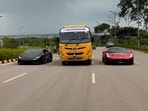 A Lamborghini owner delighted schoolchildren by letting them explore his supercar before surprising them with another luxury car.(Instagram/rakesh_knv)