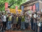 Students stage a protest march against alleged irregularities in the examinations conducted by NTA, at Arts Faculty of Delhi University