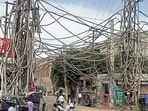 Dangerously hanging overhead electric wires in Ludhiana on Saturday. (HT PHOTO)