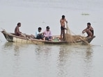 Fishermen near Nagvasuki temple in Daraganj where water of Ganga had reached on Sunday. (Anil Kumar Maurya/HT)