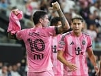 Inter Miami midfielder Rodrigo de Paul, left, celebrates after scoring a goal, wearing the shirt of teammate Lionel Messi (10) who did not play due to death of his father(AP Photo/Lynne Sladky)