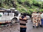 Mangled remains of the private bus after it overturned on the Bairagarh-Tissa road in Chamba on Saturday.