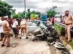 Police personnel at the site of an accident after a speeding car crashed into a stationary truck on the Jalandhar-Maksudan Bypass Highway, in Jalandhar on Saturday. (ANI Video Grab)